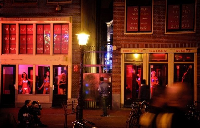 Amsterdam Red Light District windows (picture courtesy of RudmerHK, Flickr)