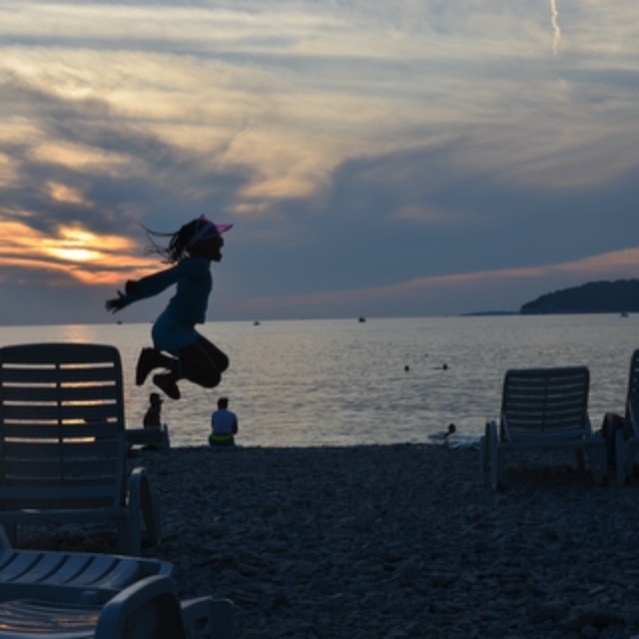 Jumping for joy at the Verudela beach, Pula Croatia