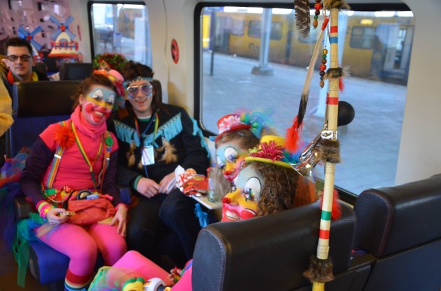 Dutch train goers going to carnival in Eindhoven.